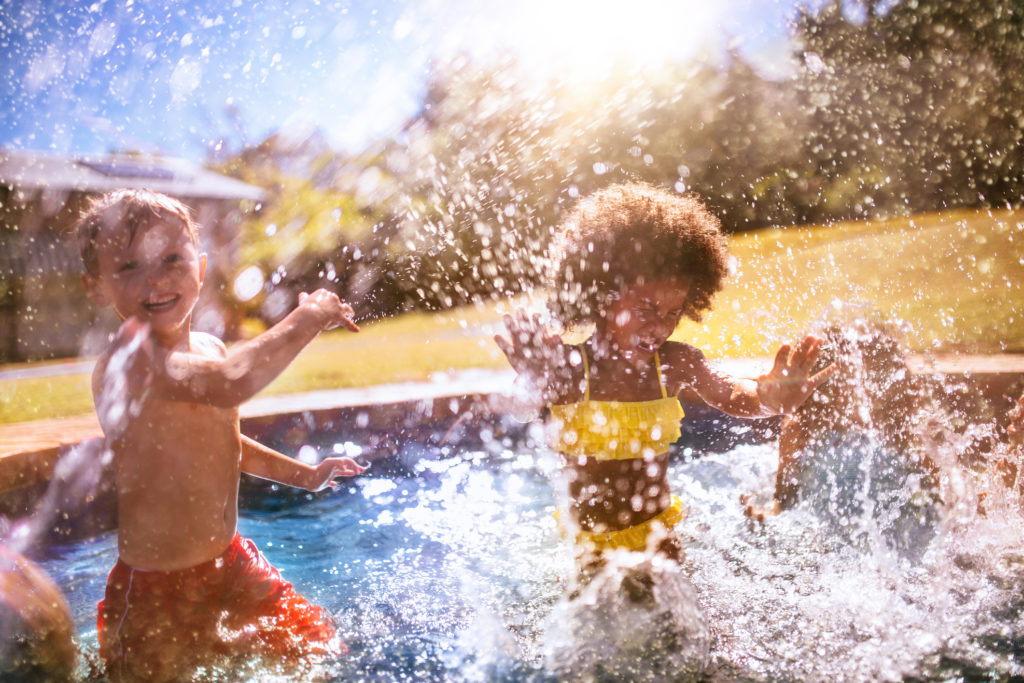 two children playing in New Carrollton apartment pool